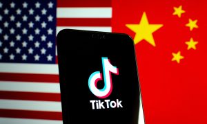 USA and China flags, and TikTok logo