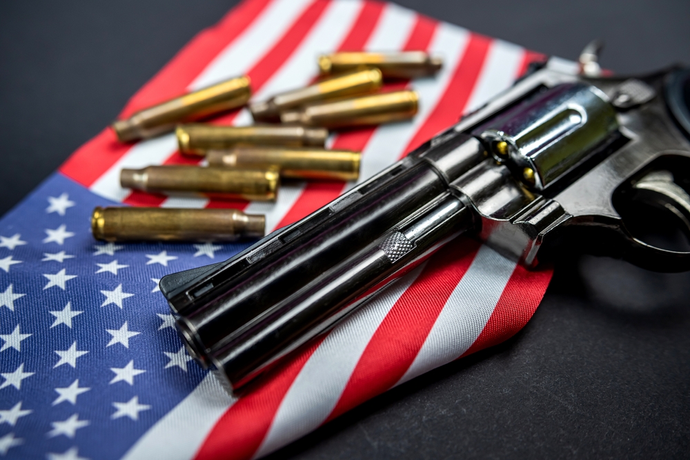 Gun and bullets on the USA flag
