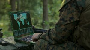 Soldier using military grade laptops