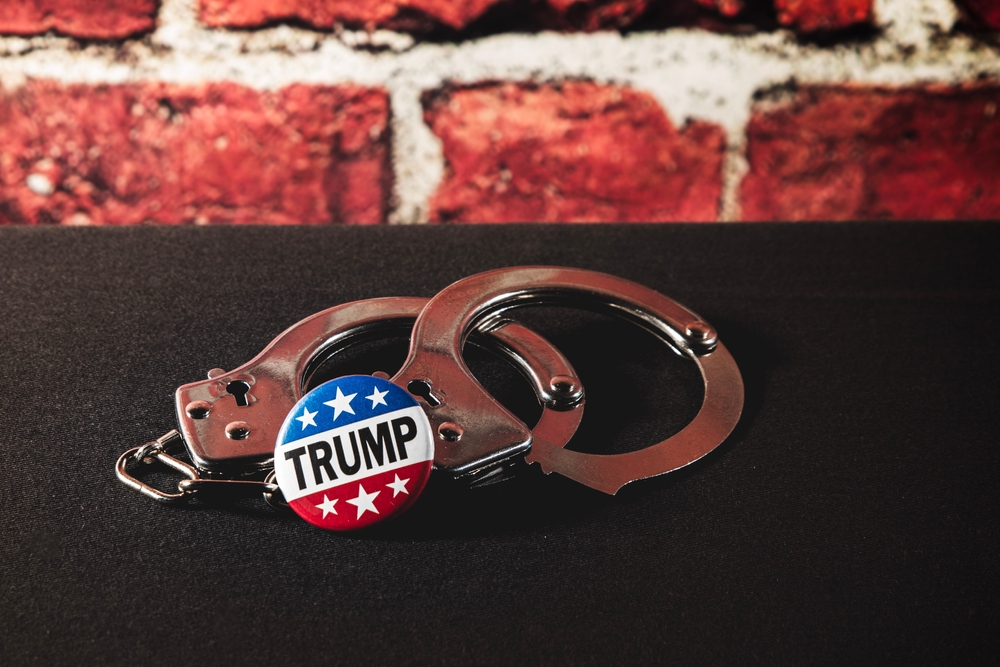Trump's badge and handcuffs