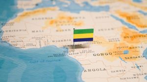 The,Flag,Of,Gabon,On,The,World,Map.