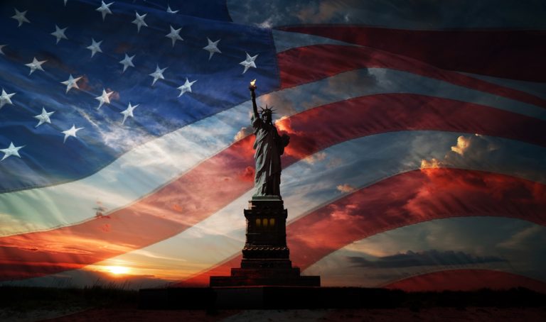 Statue,Of,Liberty,On,The,Background,Of,Flag,Usa