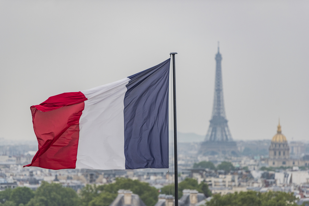 French,Flag,And,Eiffel,Tower,In,Paris