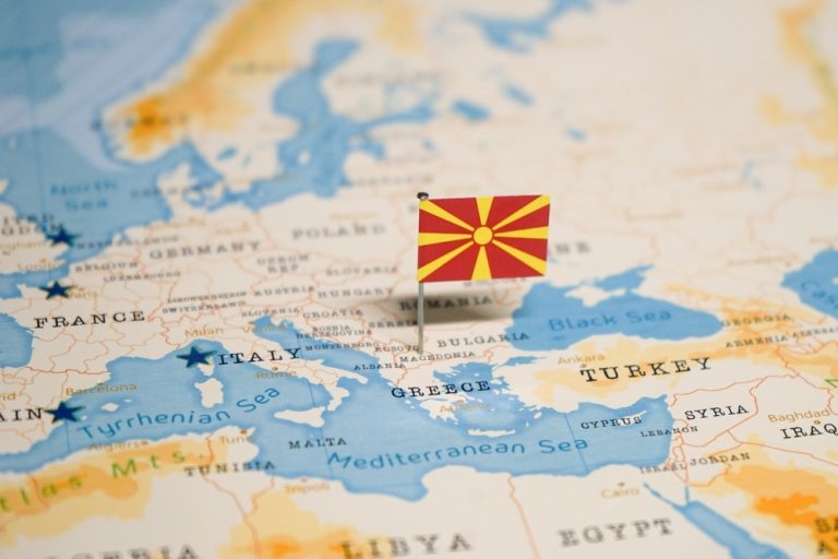 The,Flag,Of,North,Macedonia,On,The,World,Map.