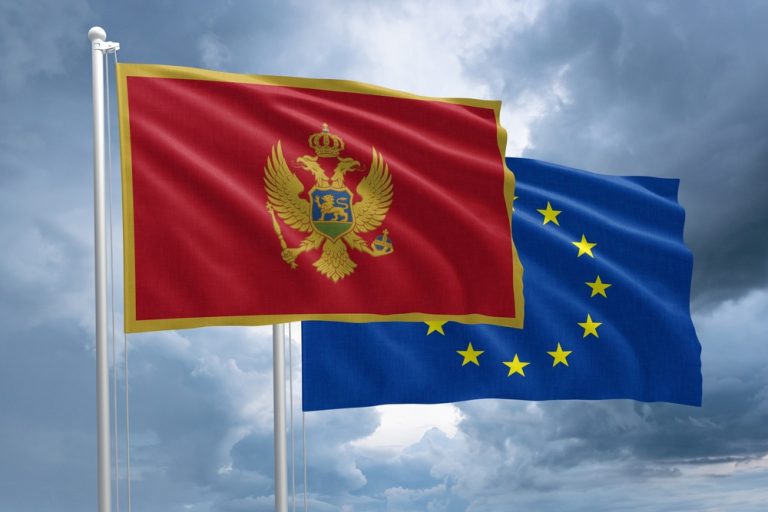 Montenegro,And,Eu,Flag,Together,Next,To,Each,Other,On