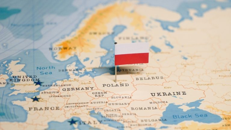 The,Flag,Of,Poland,On,The,World,Map.