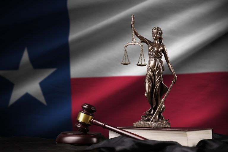 Texas,Us,State,Flag,With,Statue,Of,Lady,Justice,,Constitution